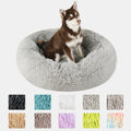Calming donut dog bed in plush faux fur